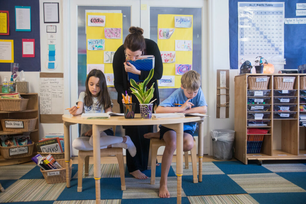 students at desk in classroom