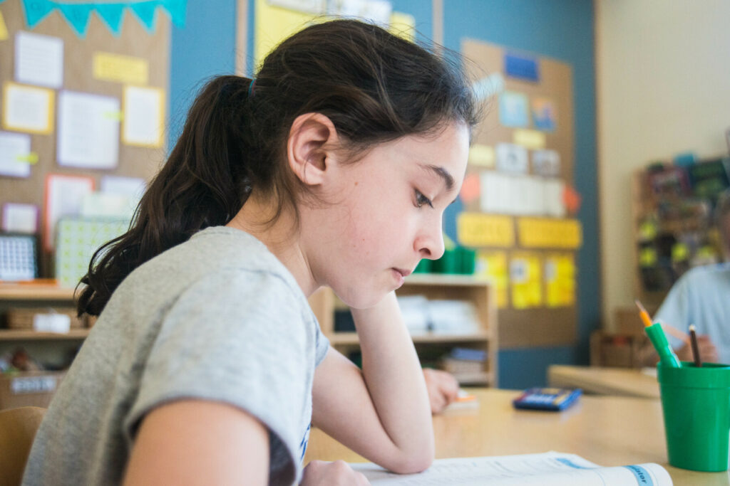 student focused on her work