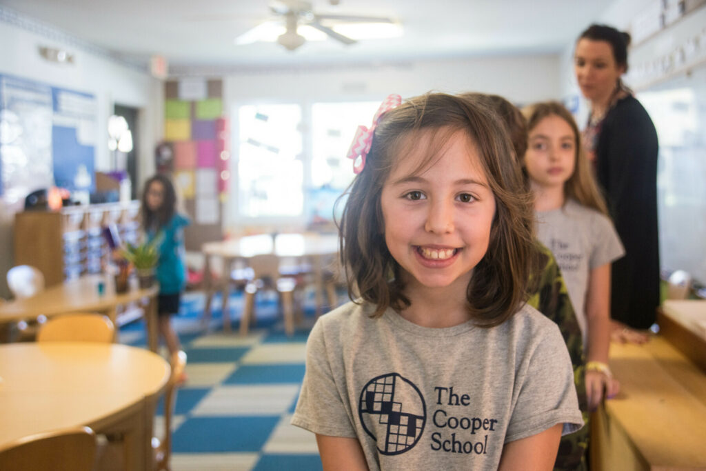 students in classroom with teacher