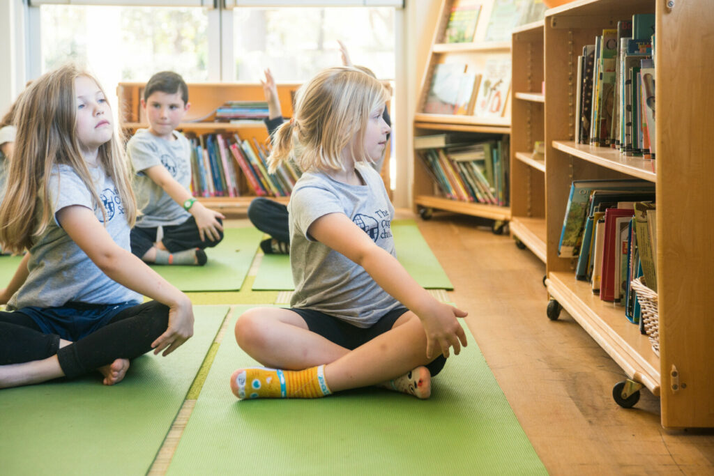 students doing yoga