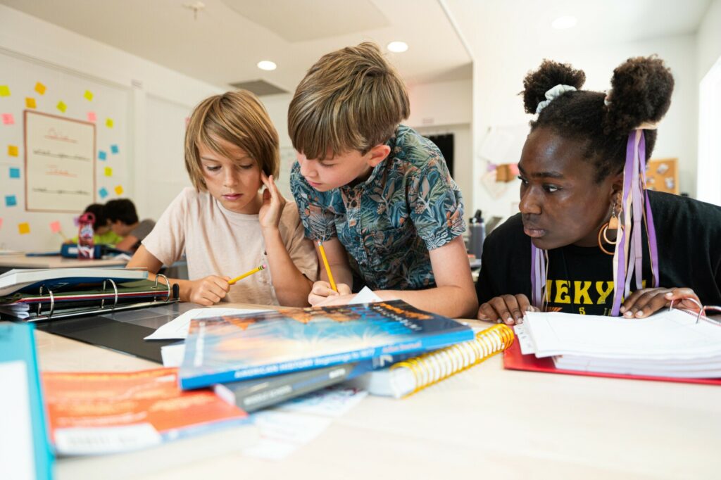 students sitting at table